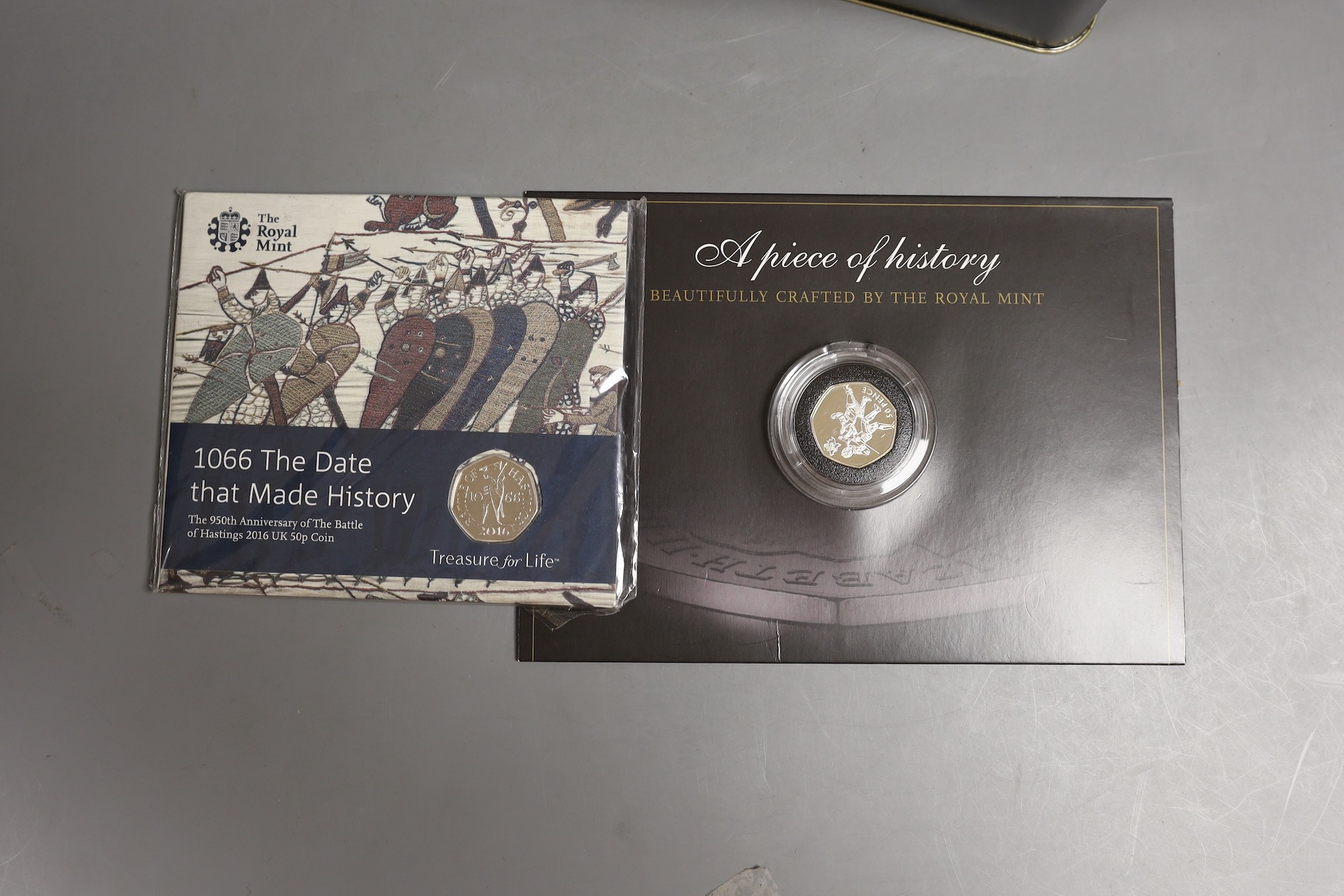 A collection of UK Royal mint brilliant uncirculated commemorative coins in presentation packs